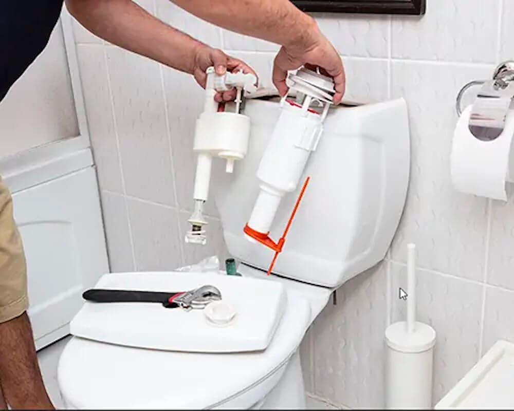 Lắp đặt van xả mới vào bồn cầu