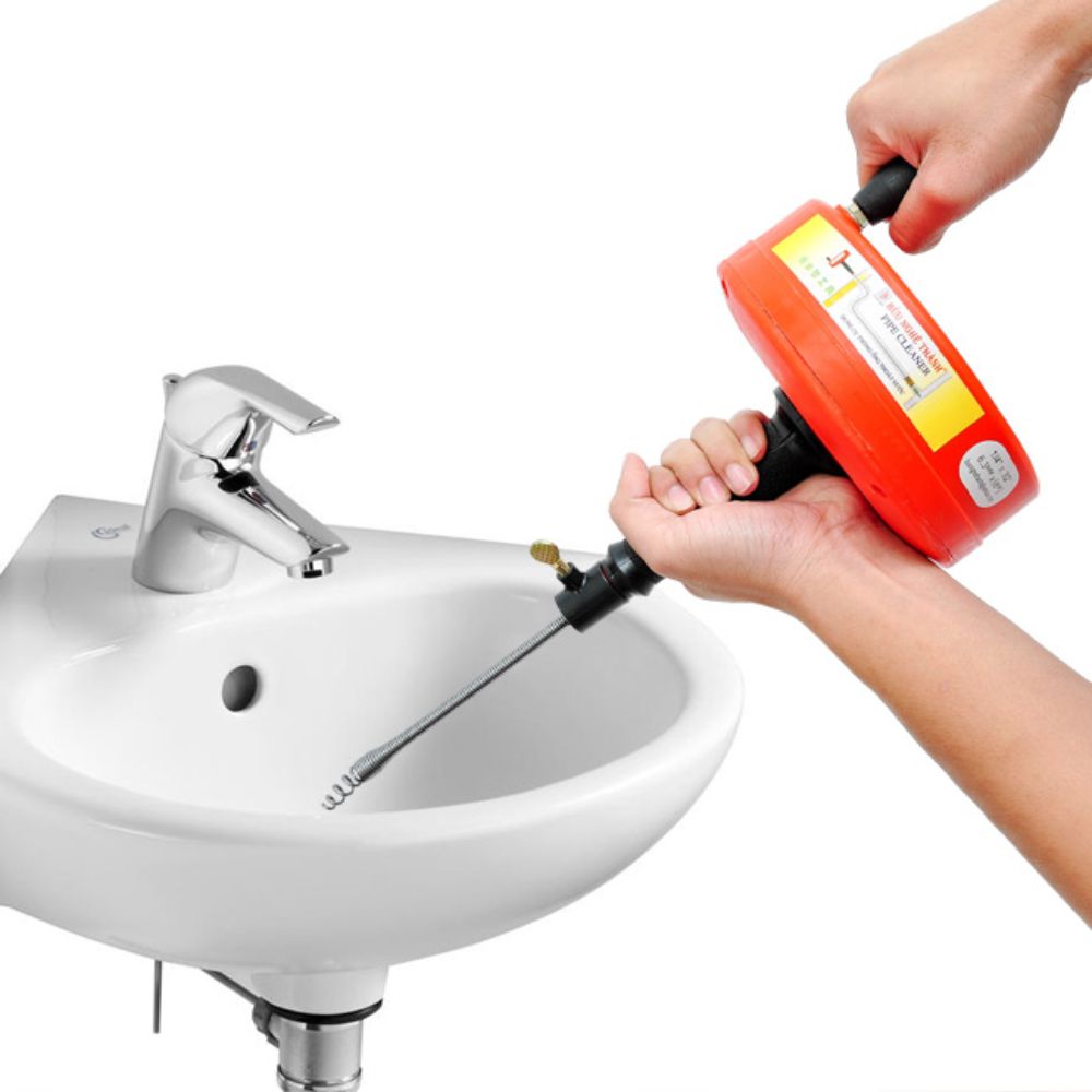 D&ugrave;ng l&ograve; xo th&ocirc;ng nghẹt chậu rửa lavabo