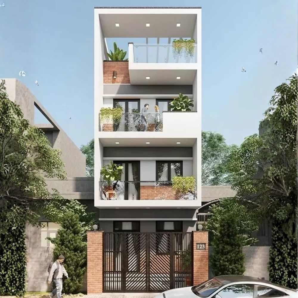 Nh&agrave; ống 3 tầng 5m phong c&aacute;ch hiện đại, h&agrave;i h&ograve;a với t&ocirc;ng trắng chủ đạo kết hợp vật liệu k&iacute;nh, b&ecirc; t&ocirc;ng v&agrave; c&acirc;y xanh