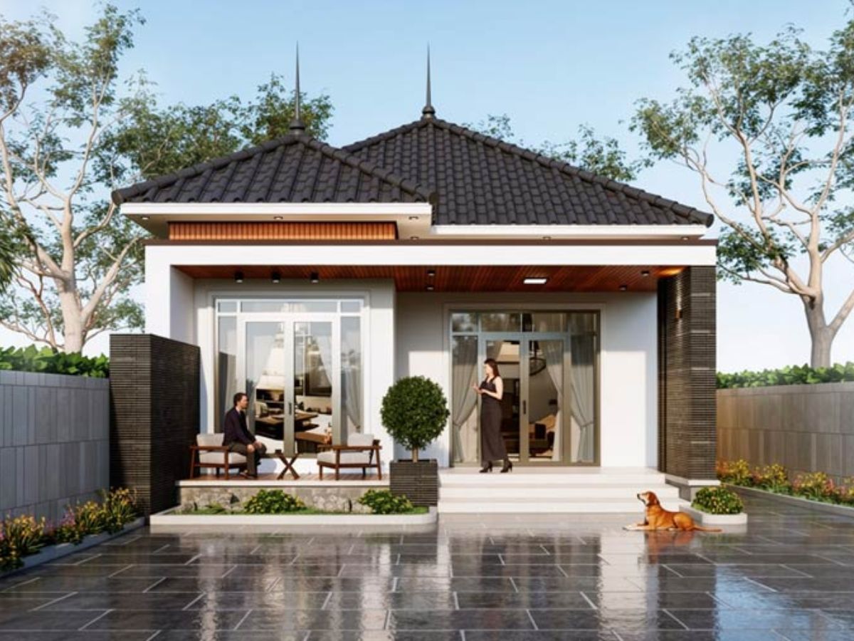 Thiết kế nh&agrave; 1 tầng 8x12 m&aacute;i Nhật với khoảng s&acirc;n rộng, tường s&aacute;ng m&agrave;u v&agrave; h&agrave;ng c&acirc;y thấp dọc lối đi