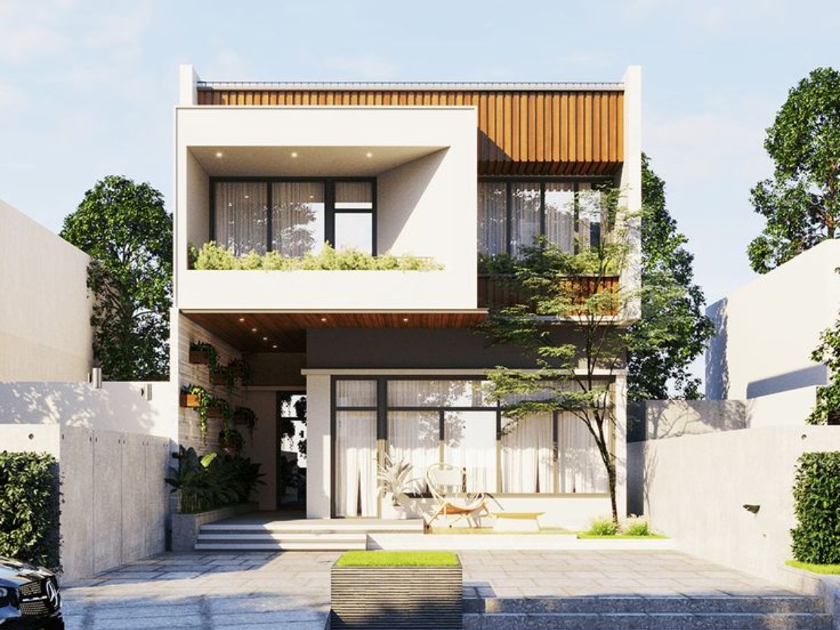 Mẫu nh&agrave; vu&ocirc;ng 2 tầng hiện đại với cửa k&iacute;nh lớn v&agrave; c&acirc;y xanh, tạo kh&ocirc;ng gian sống gần gũi với thi&ecirc;n nhi&ecirc;n v&agrave; tr&agrave;n ngập &aacute;nh s&aacute;ng tự nhi&ecirc;n