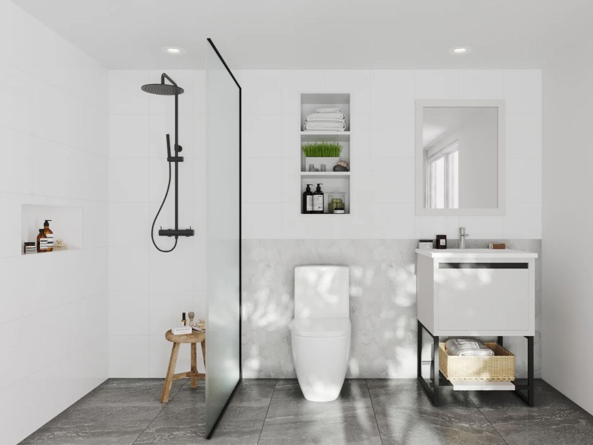 Ph&ograve;ng tắm t&aacute;ch biệt nh&agrave; vệ sinh c&oacute; phong c&aacute;ch tối giản với tone trắng chủ đạo kết hợp gạch m&agrave;u x&aacute;m