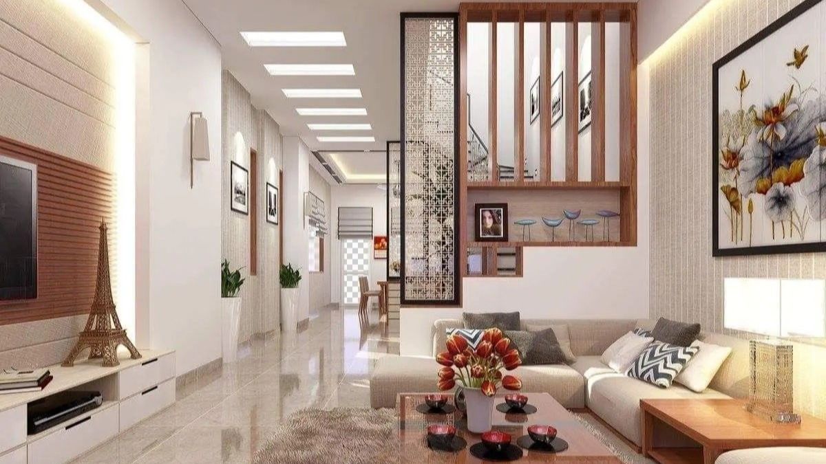 Thiết kế lam ngăn c&aacute;ch ph&ograve;ng kh&aacute;ch với cầu thang kết hợp kệ trang tr&iacute; bắt mắt