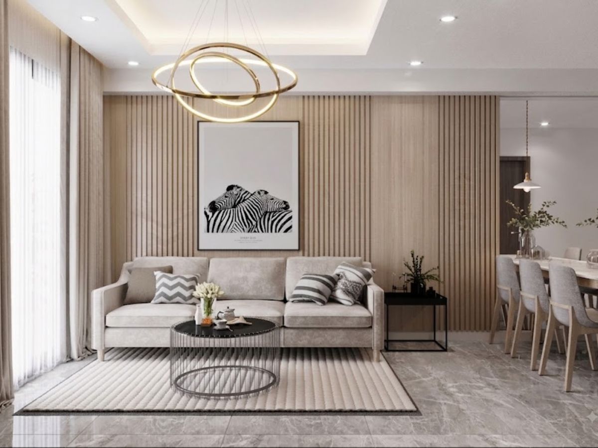 Trang tr&iacute; bức tường sau sofa ph&ograve;ng kh&aacute;ch với mẫu lam kết hợp tranh nghệ thuật