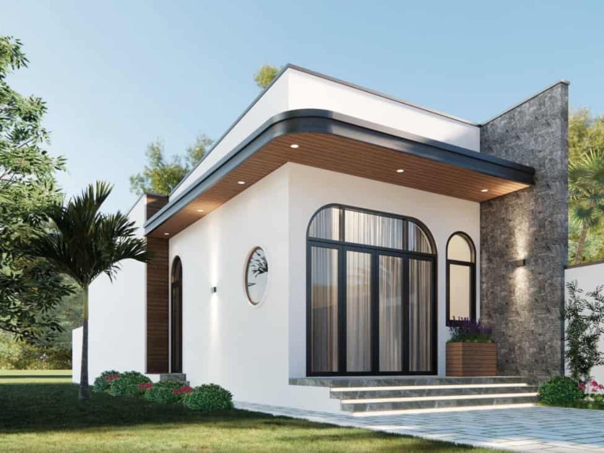 Thiết kế nh&agrave; 1 tầng hiện đại sử dụng vật liệu k&iacute;nh, b&ecirc; t&ocirc;ng quen thuộc với tone trắng thanh lịch