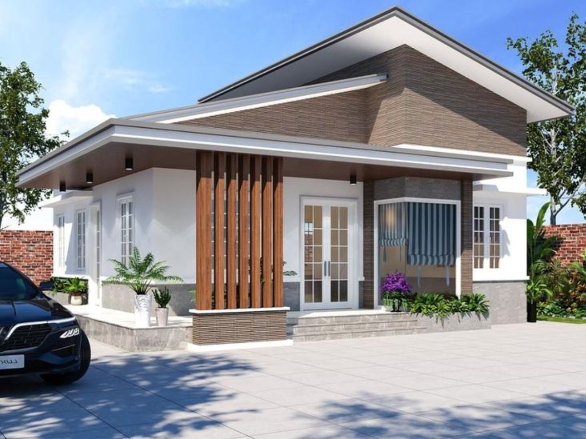 Nh&agrave; m&aacute;i lệch hiện đại kết hợp với c&aacute;c vật liệu hiện đại như k&iacute;nh, b&ecirc; t&ocirc;ng v&agrave; lam gỗ