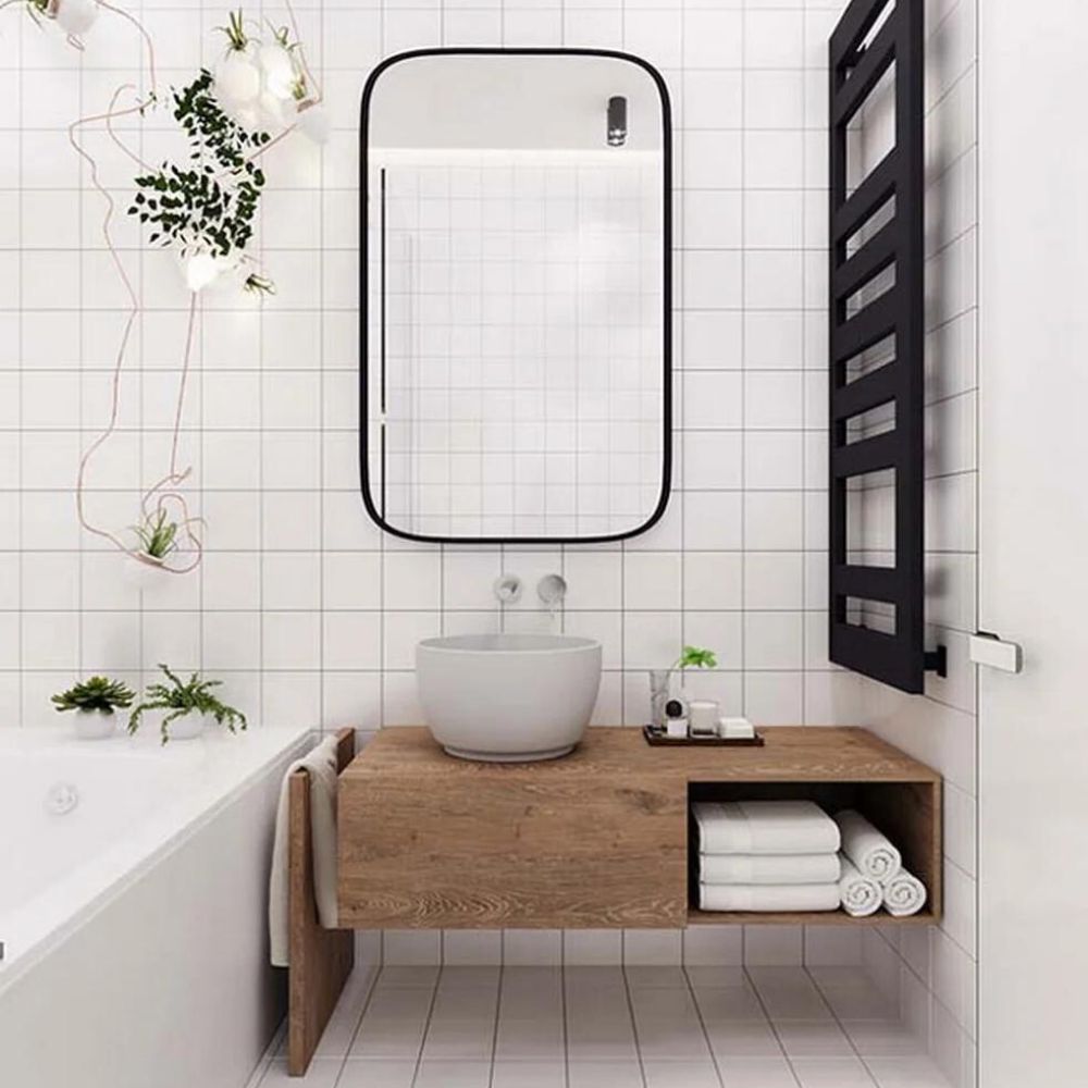 Tạo điểm nhấn bắt mắt cho ph&ograve;ng tắm 4m2 phong c&aacute;ch vintage với tủ gỗ v&agrave; lavabo đ&aacute;