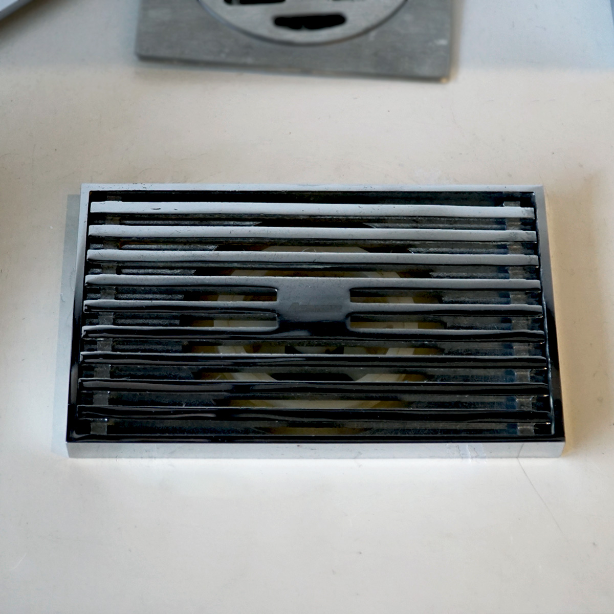 Phễu thoát sàn đồng mạ chrome 14x9cm ATMOR 8109