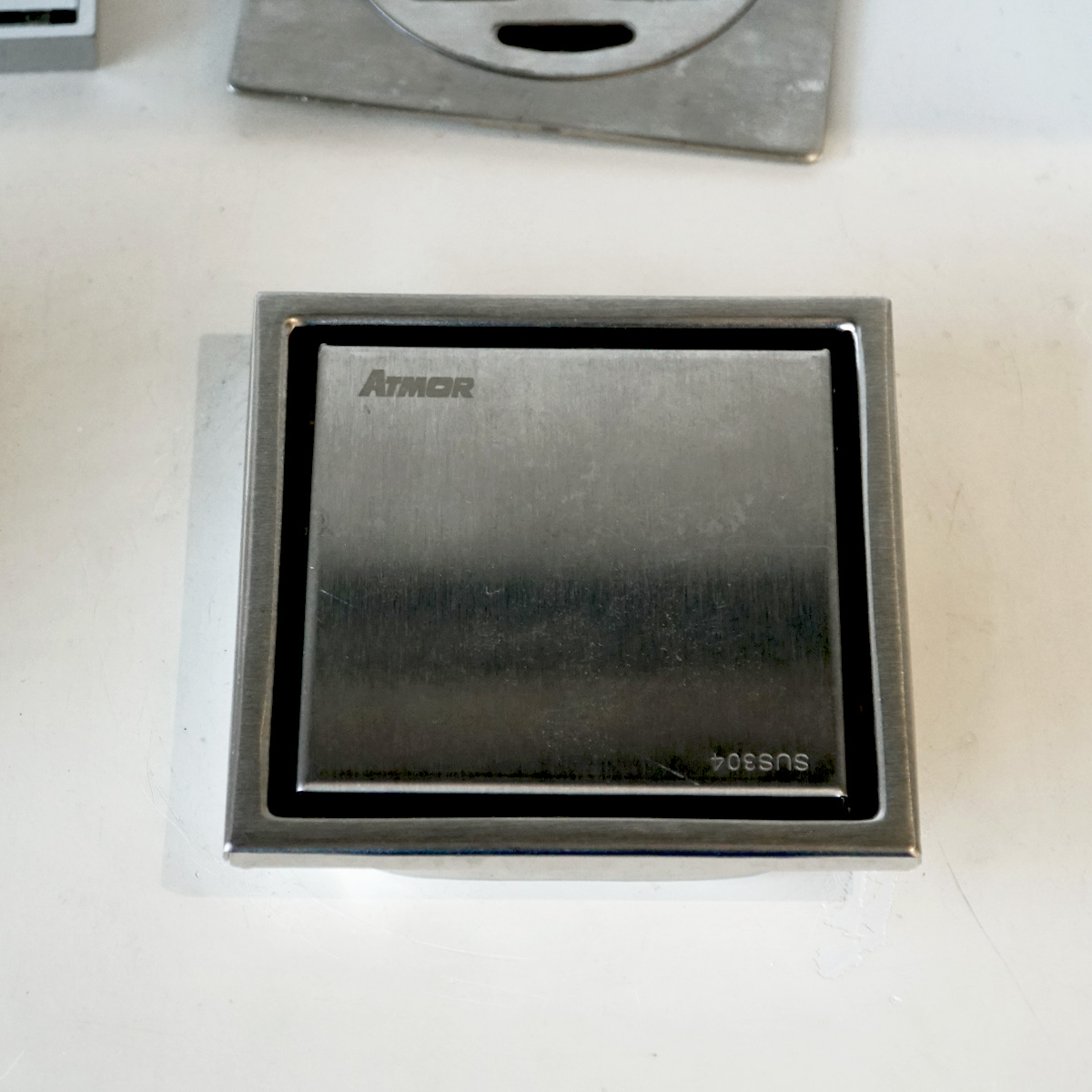 Phễu thoát sàn 10x10cm Ø90 ATMOR AH087-1 (AH0871)