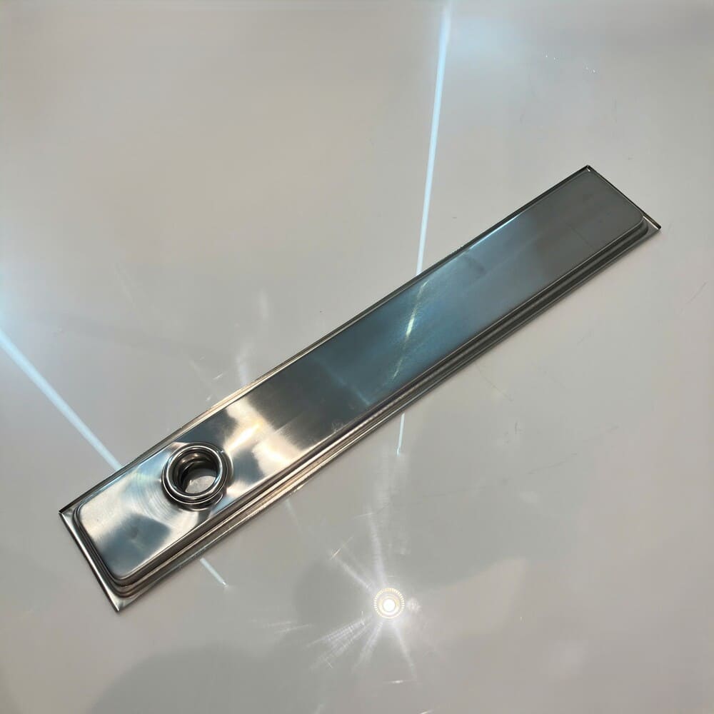 Phễu thoát sàn dài 10x60cm ø60 Caesar ST1060B