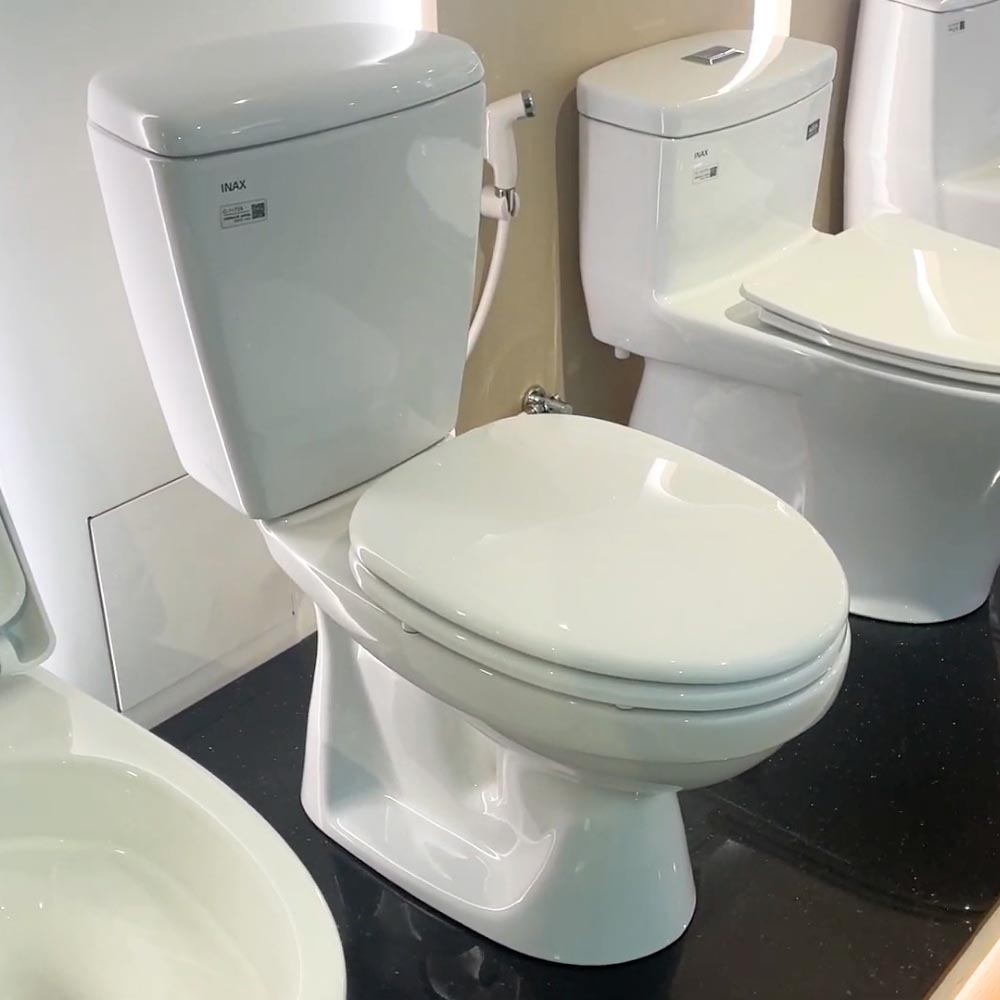 Bồn cầu 2 khối INAX C-117VA (C117VA) xả gạt nắp thường