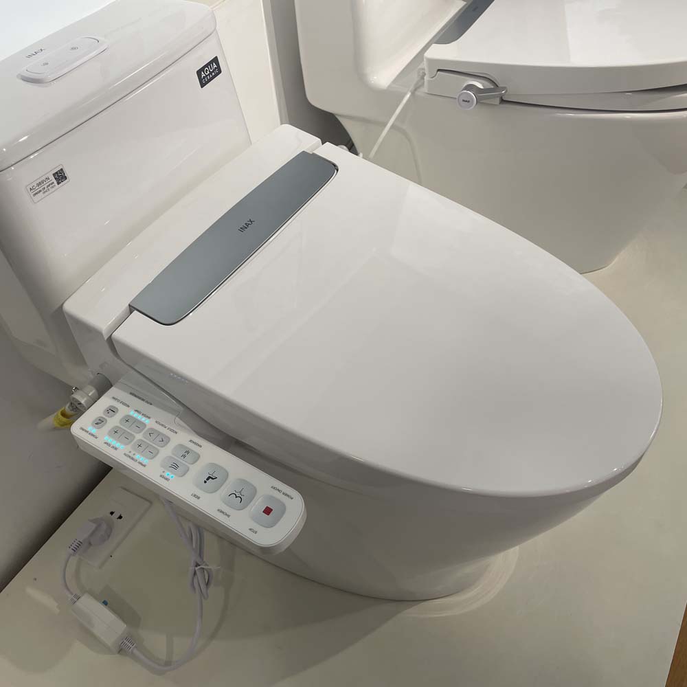 Bồn cầu 1 khối nắp điện tử INAX AC-989 + CW-H20VN