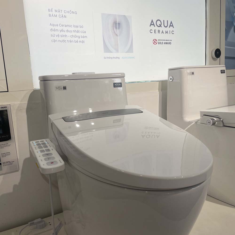 Bồn cầu 1 khối nắp điện tử INAX AC-989 + CW-H20VN