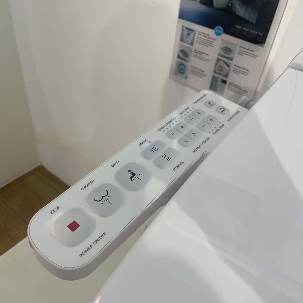 Bồn cầu 1 khối nắp điện tử INAX AC-989 + CW-H20VN