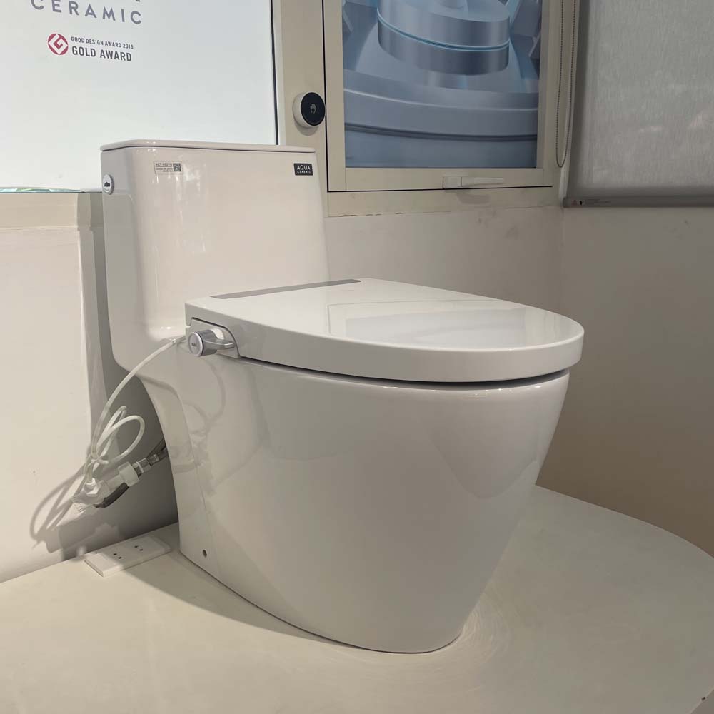 Bồn cầu 1 khối xả cảm ứng nắp rửa cơ INAX ACT-902 + CW-S32VN