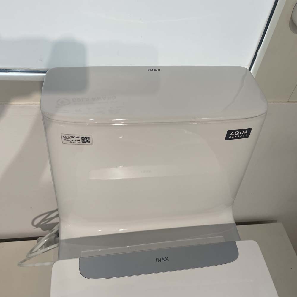 Bồn cầu 1 khối xả cảm ứng nắp rửa cơ INAX ACT-902 + CW-S32VN