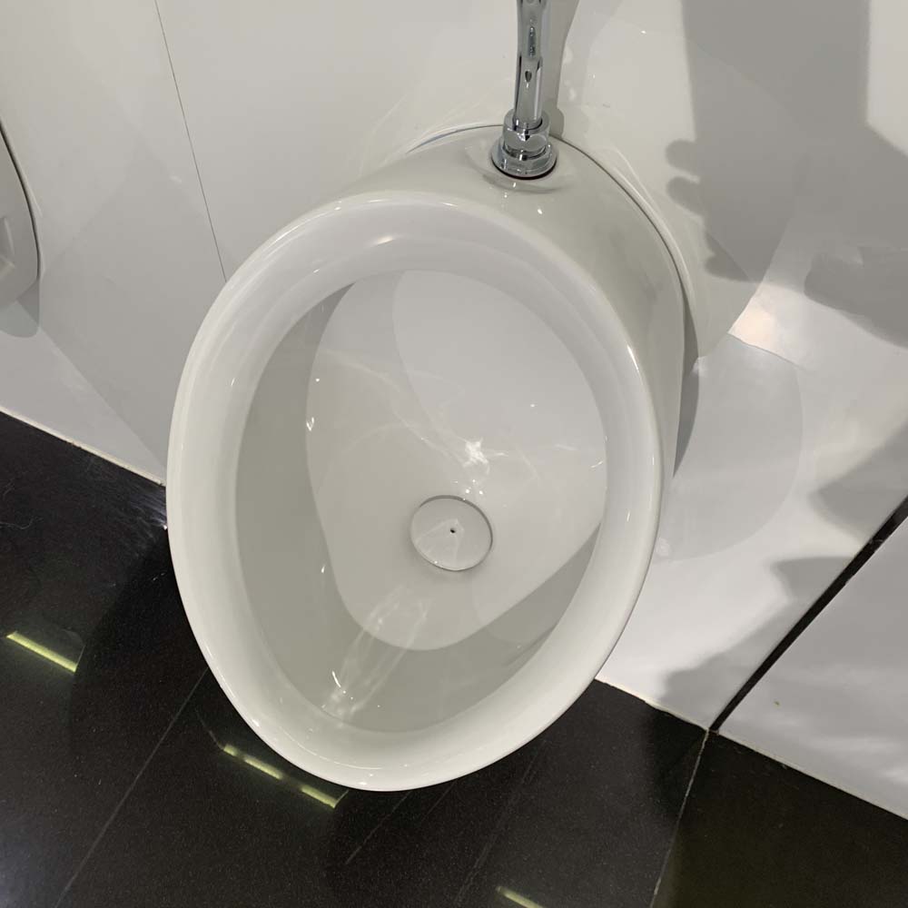 Bồn tiểu nam TOTO U104W/F DU601SRR treo tường kèm van xả nhấn