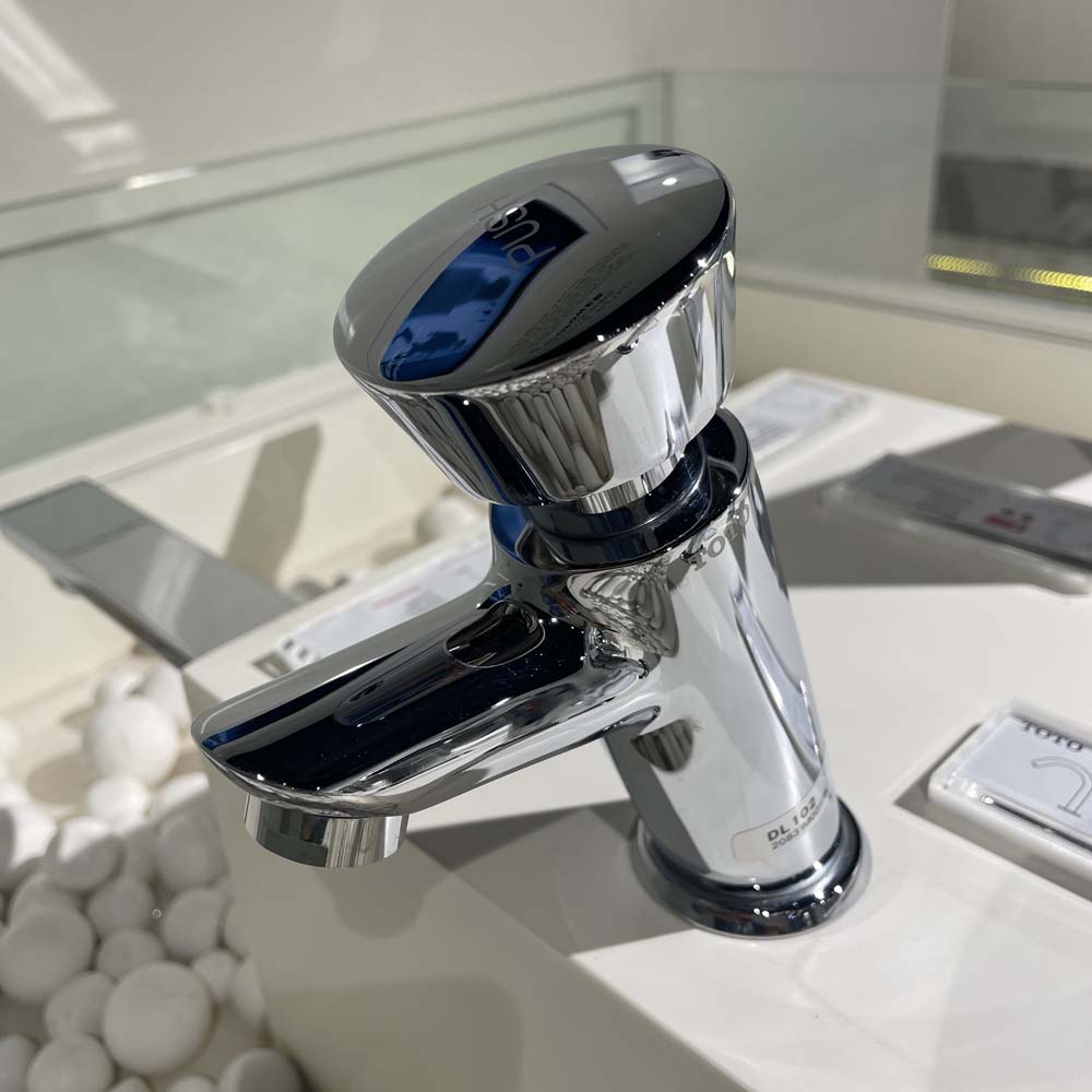 Vòi lavabo lạnh bán tự động TOTO DL102