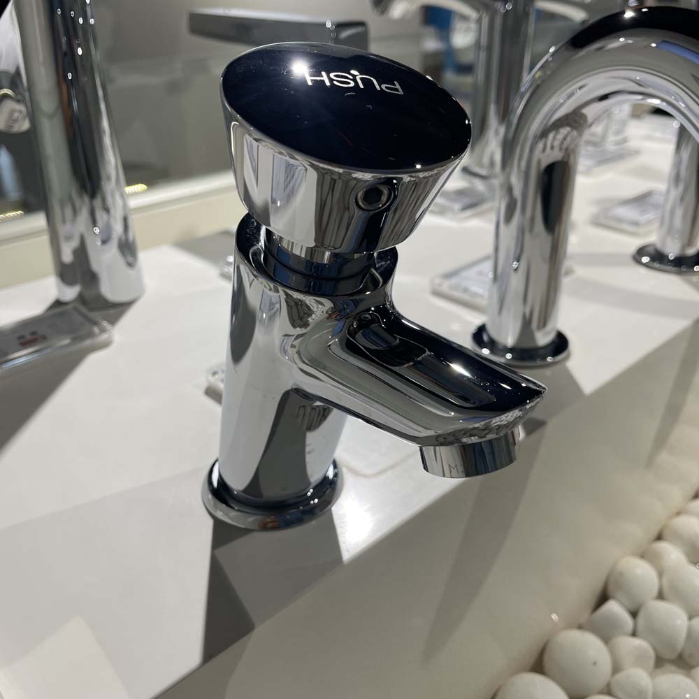 Vòi lavabo lạnh bán tự động TOTO DL102