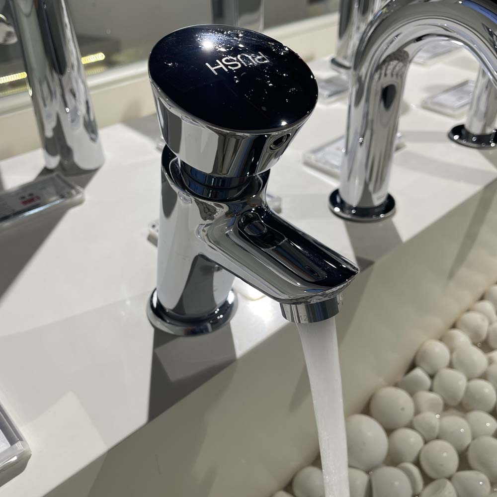 Vòi lavabo lạnh bán tự động TOTO DL102